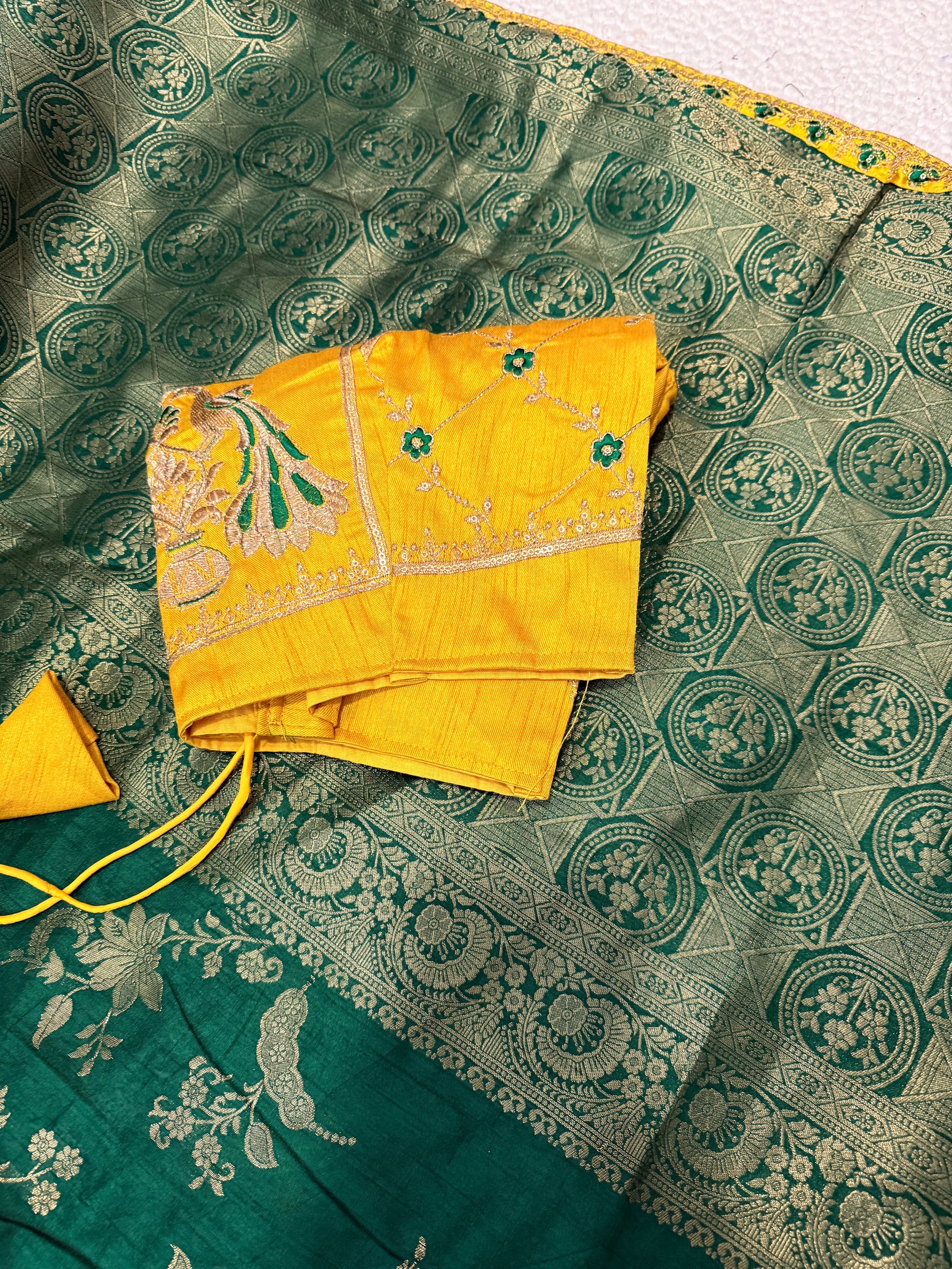 Green Dola Silk Saree with Embroidered Stitched Blouse