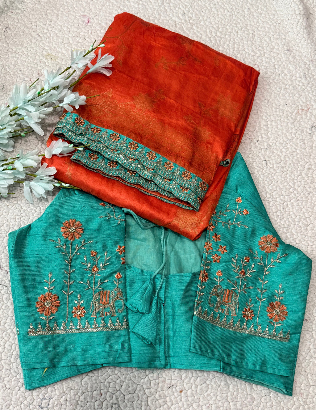 Dola Silk Saree with Embroidered Stitched Blouse