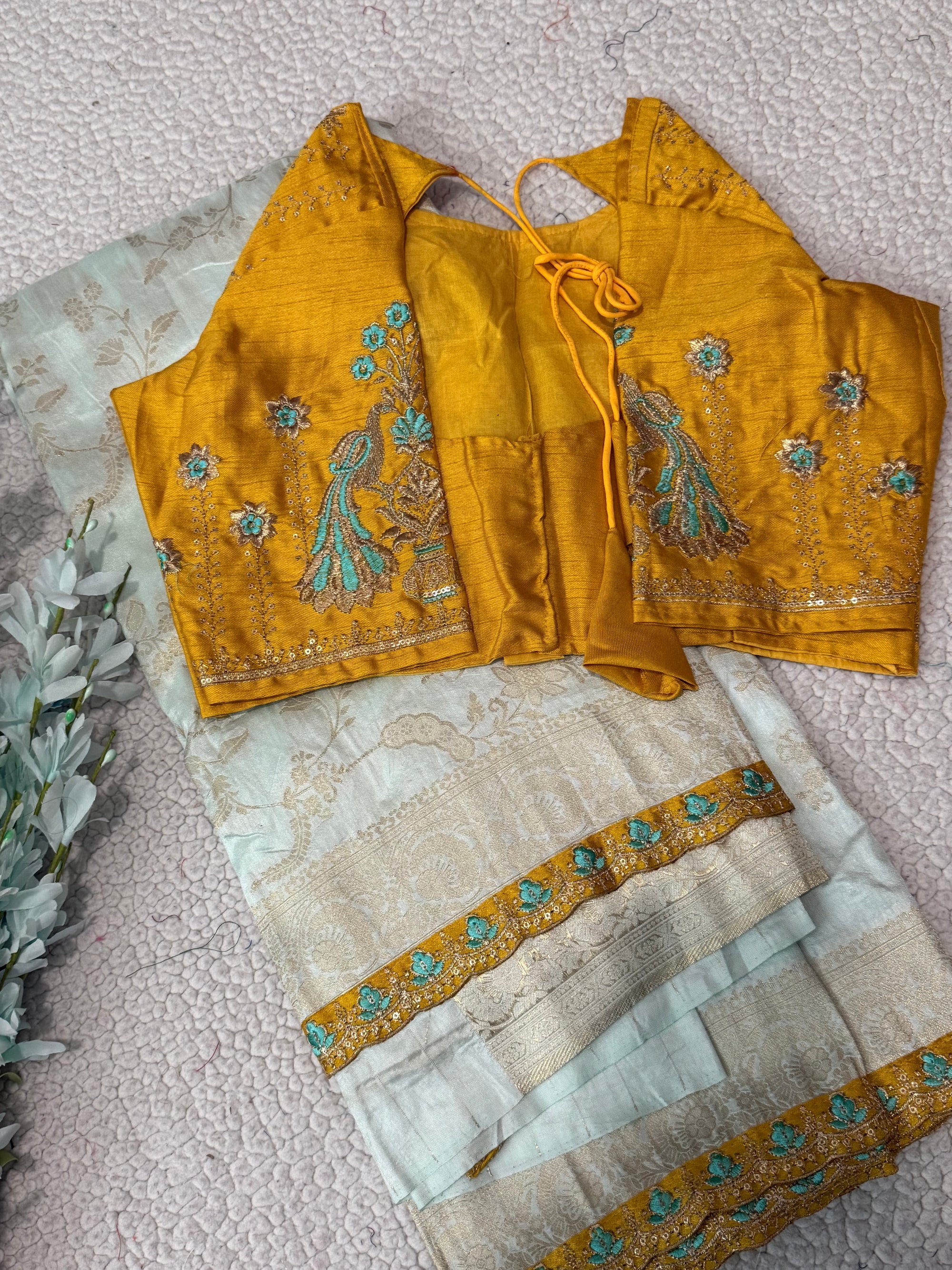 Dola Silk Saree with Embroidered Stitched Blouse