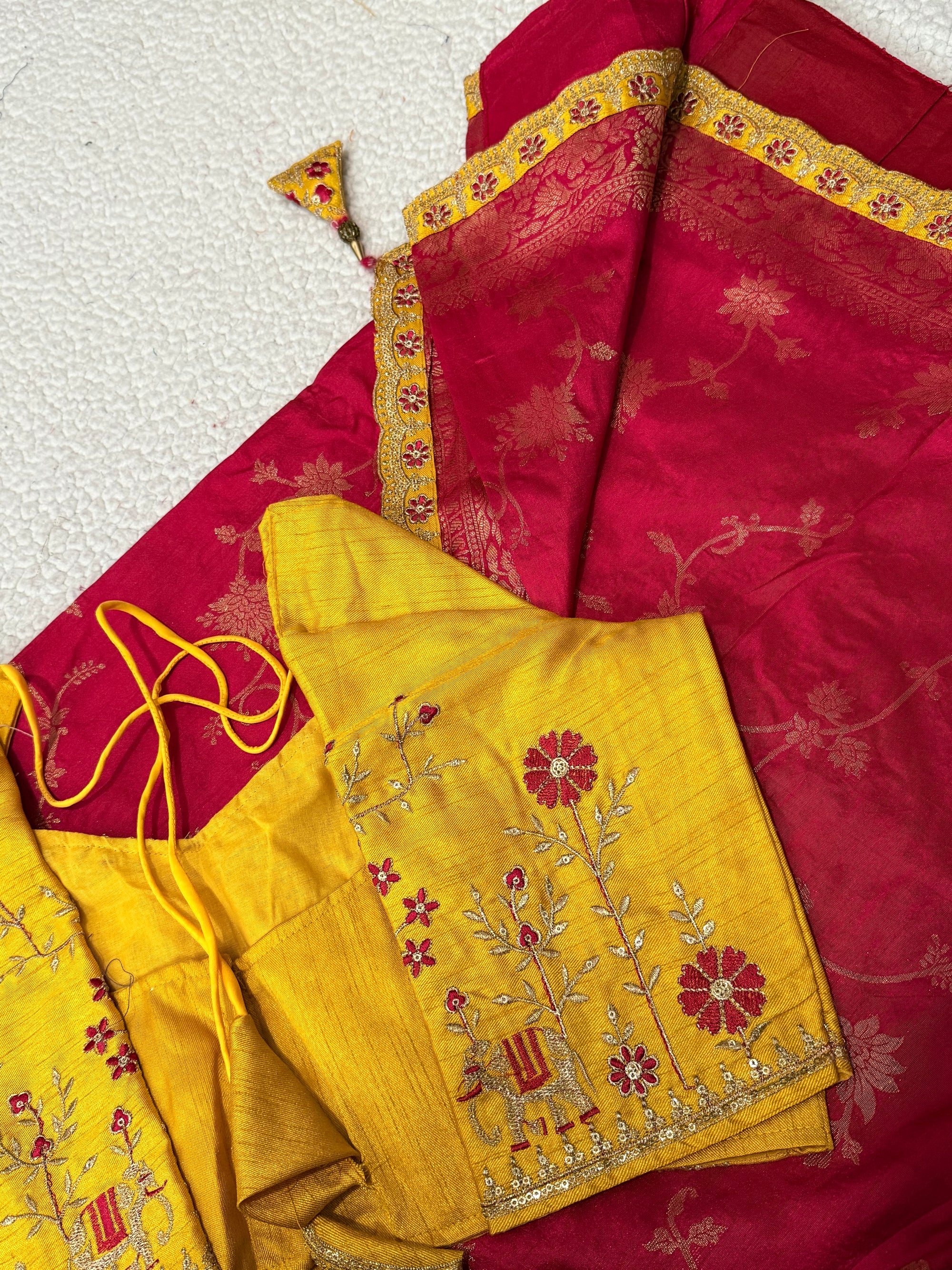 Dola Silk Saree with Embroidered Stitched Blouse