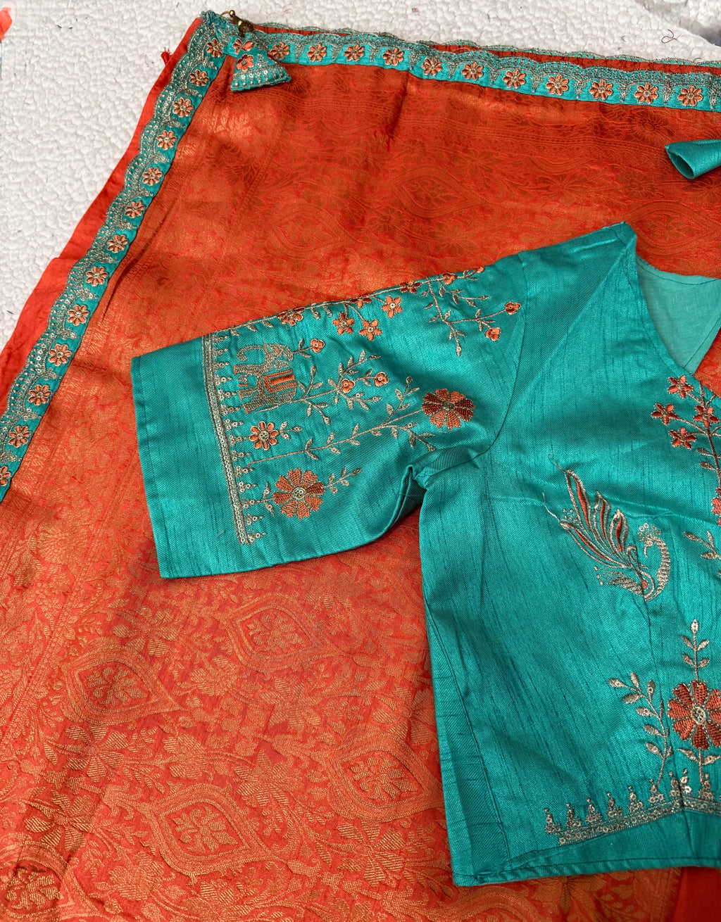 Dola Silk Saree with Embroidered Stitched Blouse
