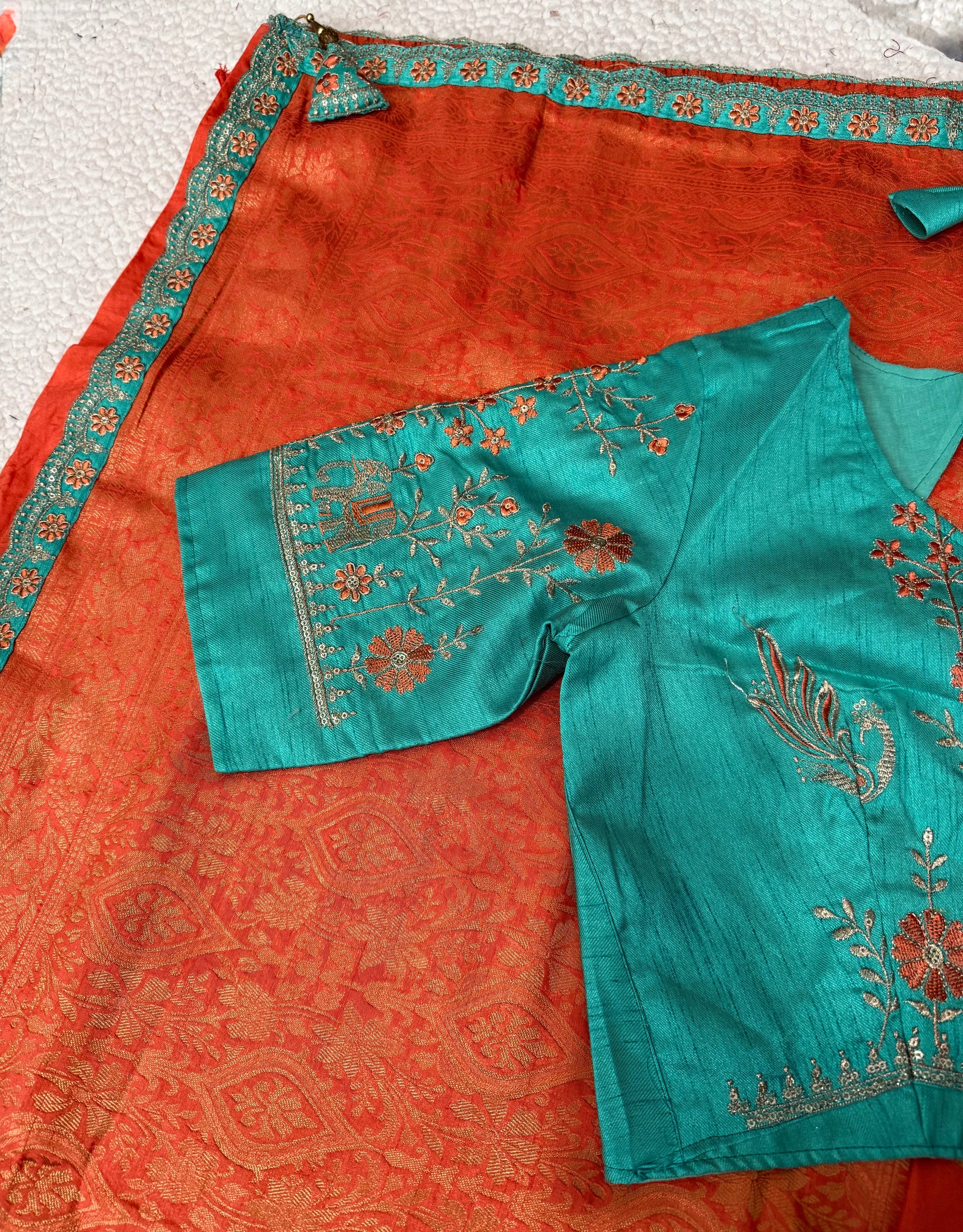 Dola Silk Saree with Embroidered Stitched Blouse