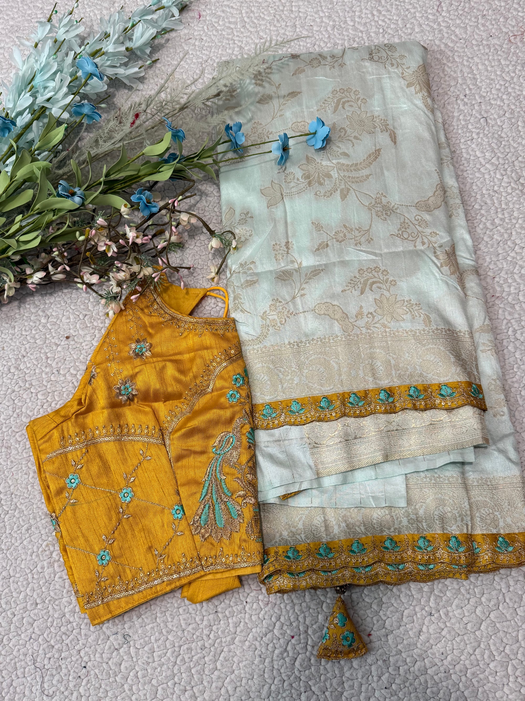 Dola Silk Saree with Embroidered Stitched Blouse